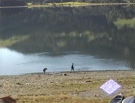 Children skimming stones on Voss Lake, as seen from Voss youth hostel